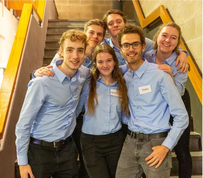 Amino members posing together at an association event